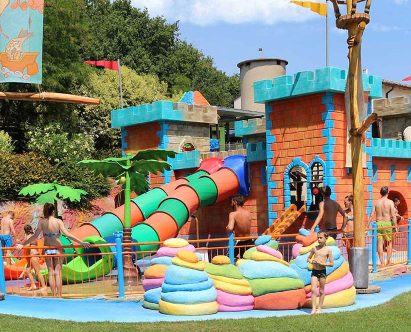 Kids playing in the water attractions at Quiete Aquapark near Lake Garda