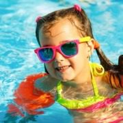 A girl swimming in an aquapark at Lake Garda