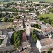 Aerial view of Castellaro Lagusello, one of Lake Garda's hidden medieval gems.