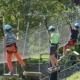 Boys crossing the adventure path at Elias Adventure Park near Lake Garda.