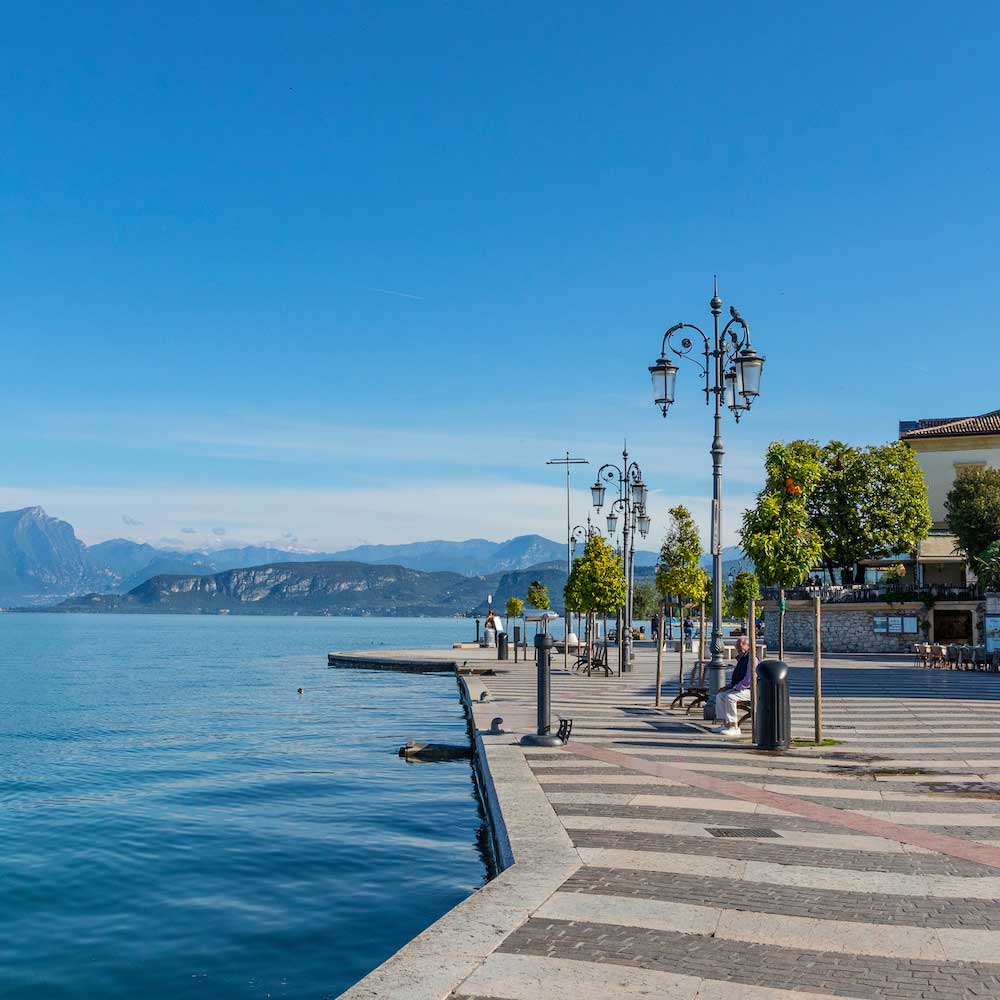 The Lungolago Marconi lakeside promenade in Lazise, Lake Garda.