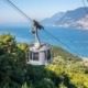 The Cable Car Monte Baldo offers breathtaking views of Lake Garda and the surrounding mountains, ascending to a height of 1,800 meters.