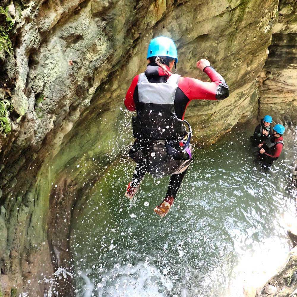 People experiencing canyoning near Torbole at Lake Garda.